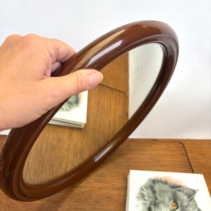 Vintage ronde spiegel bruin kunststof