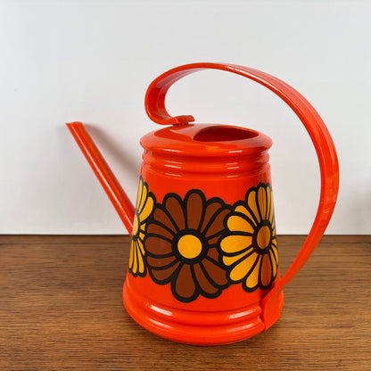 Vintage oranje Emsa gieter