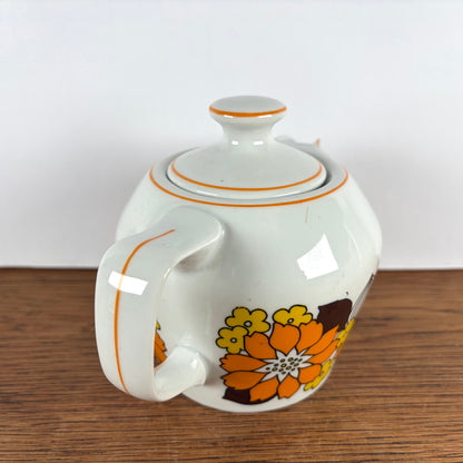 Vintage theepotje bloemen