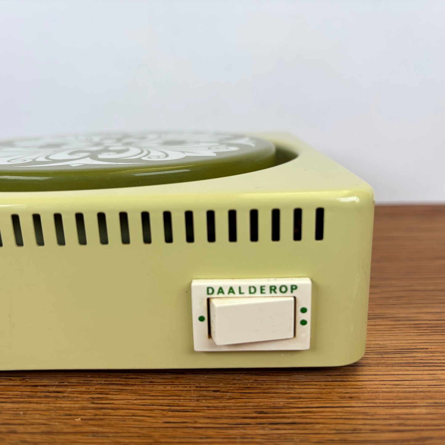 Vintage warmhoudplaatje groen