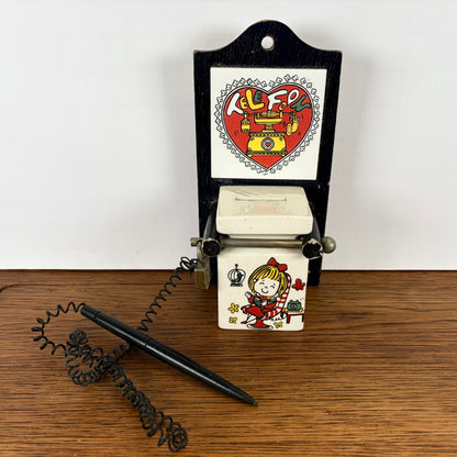 Vintage spaarpot voor telefoon