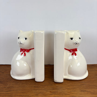 Vintage boekensteunen katten