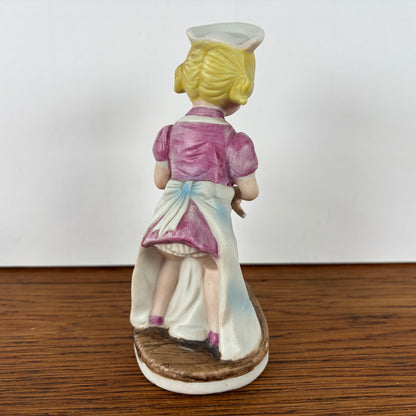 Vintage beeldje verpleegster met katje