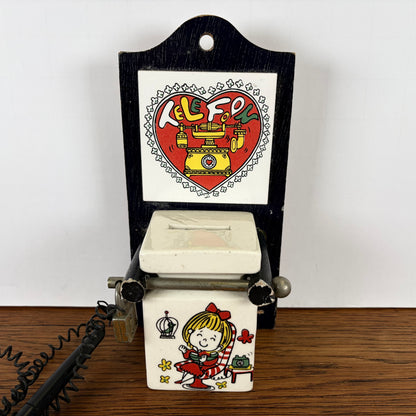 Vintage spaarpot voor telefoon