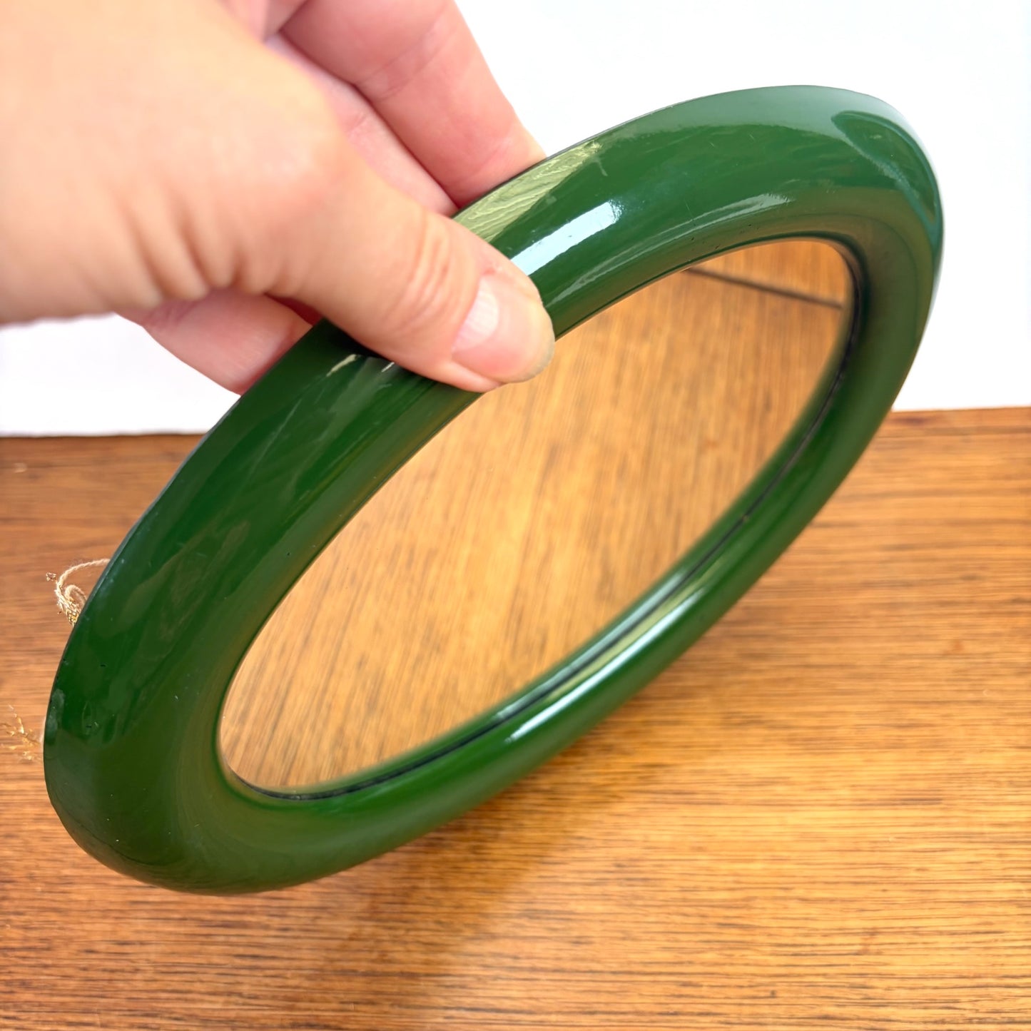 Vintage ovale spiegel groene kunststof lijst