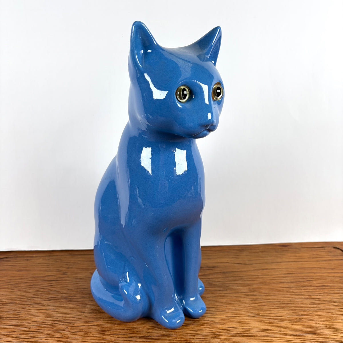 Vintage blauwe kat met groene ogen