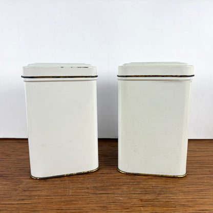 Vintage witte blikjes katten