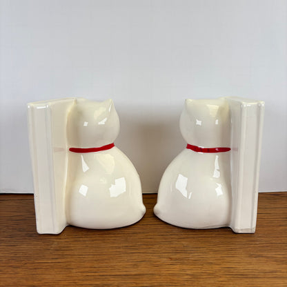 Vintage boekensteunen katten