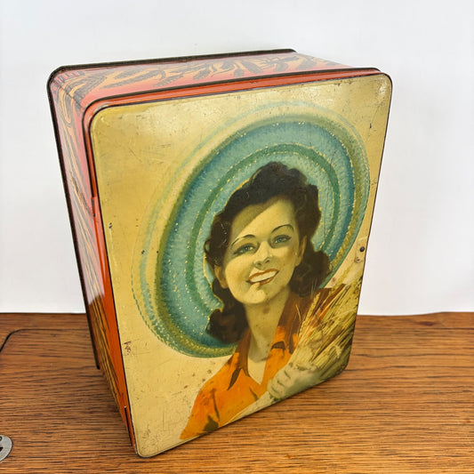 Vintage Lonka blik dame met hoed en tarwe