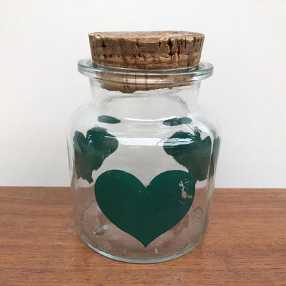 Vintage voorraadpot met groene hartjes
