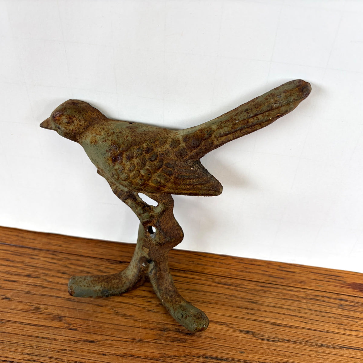 Gietijzeren wandhaak vogel