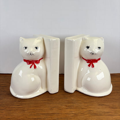 Vintage boekensteunen katten