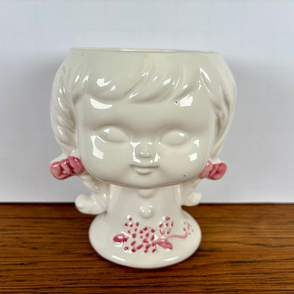 Bloempot meisjes hoofd