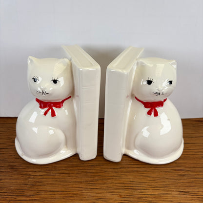 Vintage boekensteunen katten