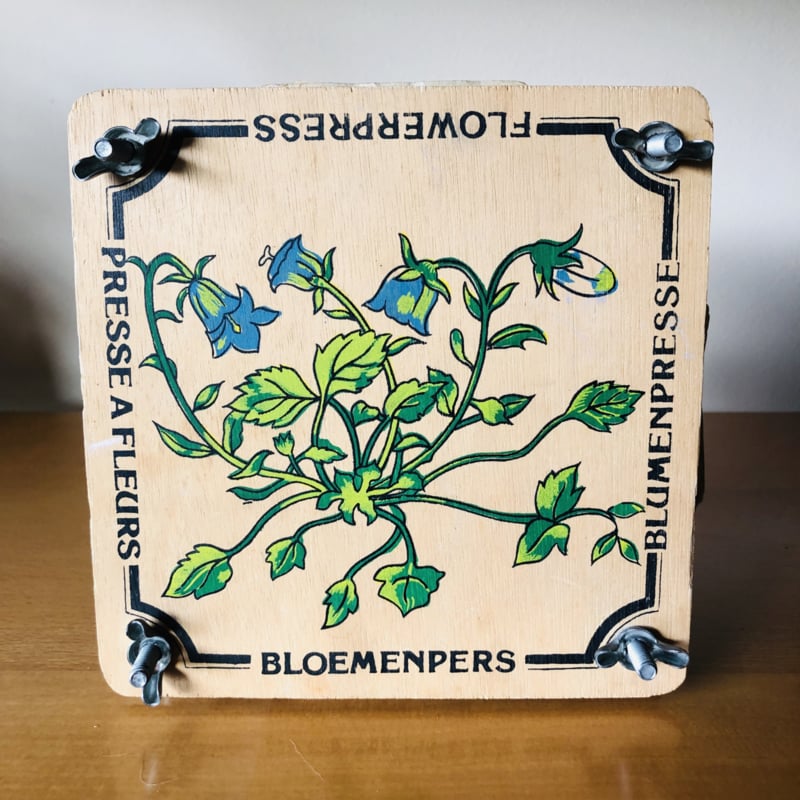 Vintage bloemenpers