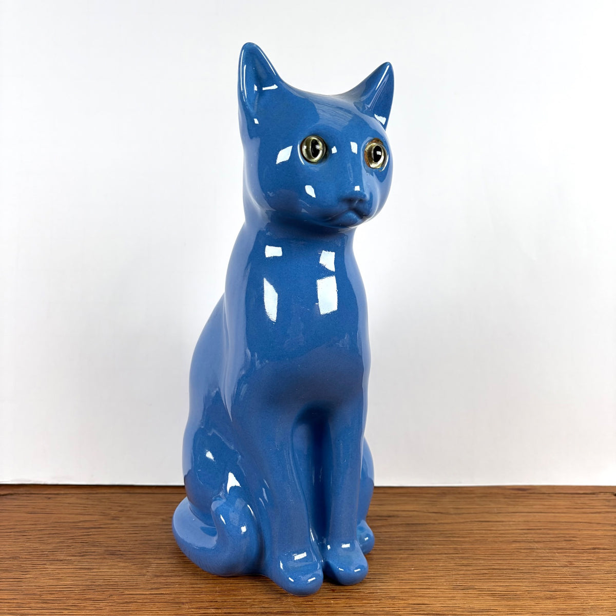 Vintage blauwe kat met groene ogen