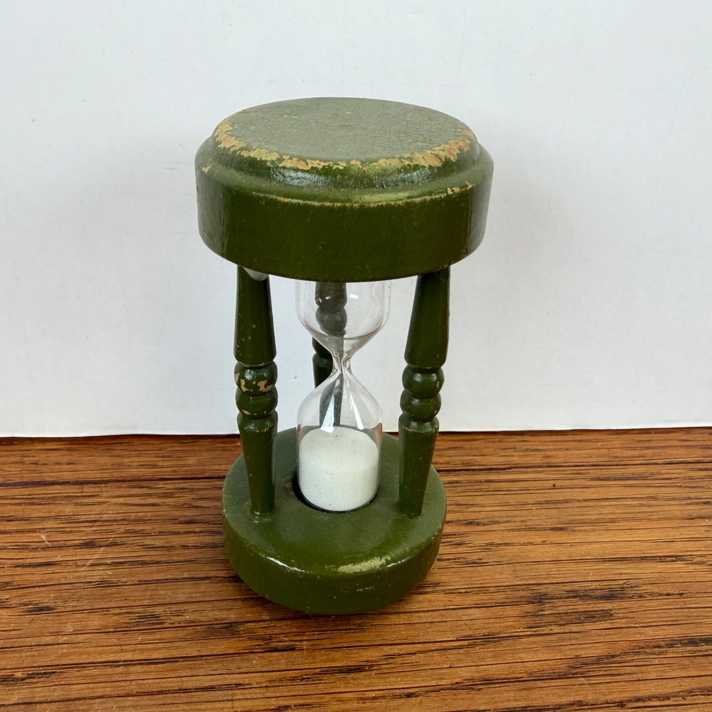 Vintage groene houten zandloper