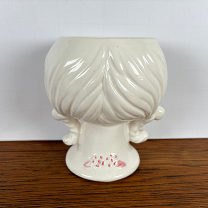 Bloempot meisjes hoofd