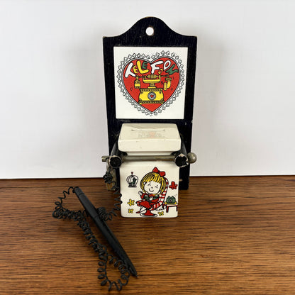 Vintage spaarpot voor telefoon