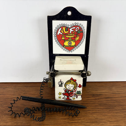 Vintage spaarpot voor telefoon