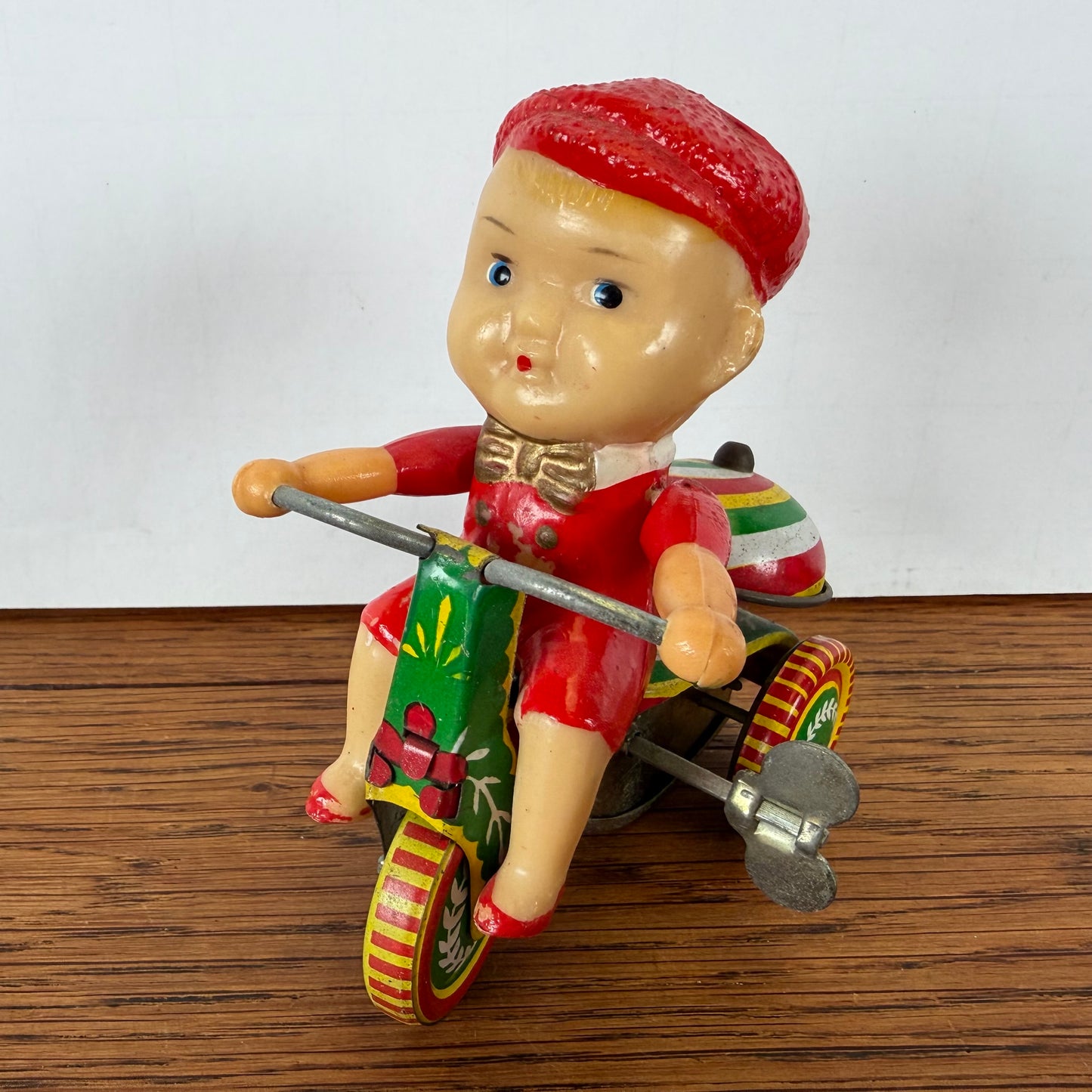 Vintage blikken speelgoed driewieler