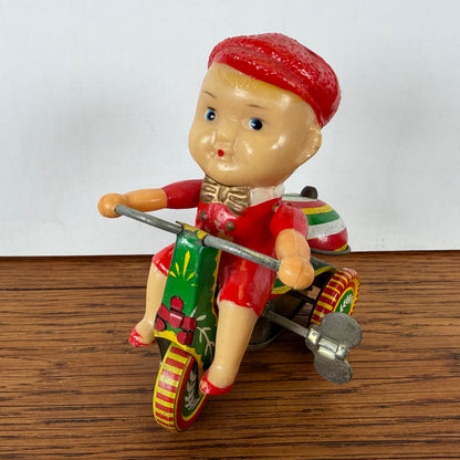 Vintage blikken speelgoed driewieler