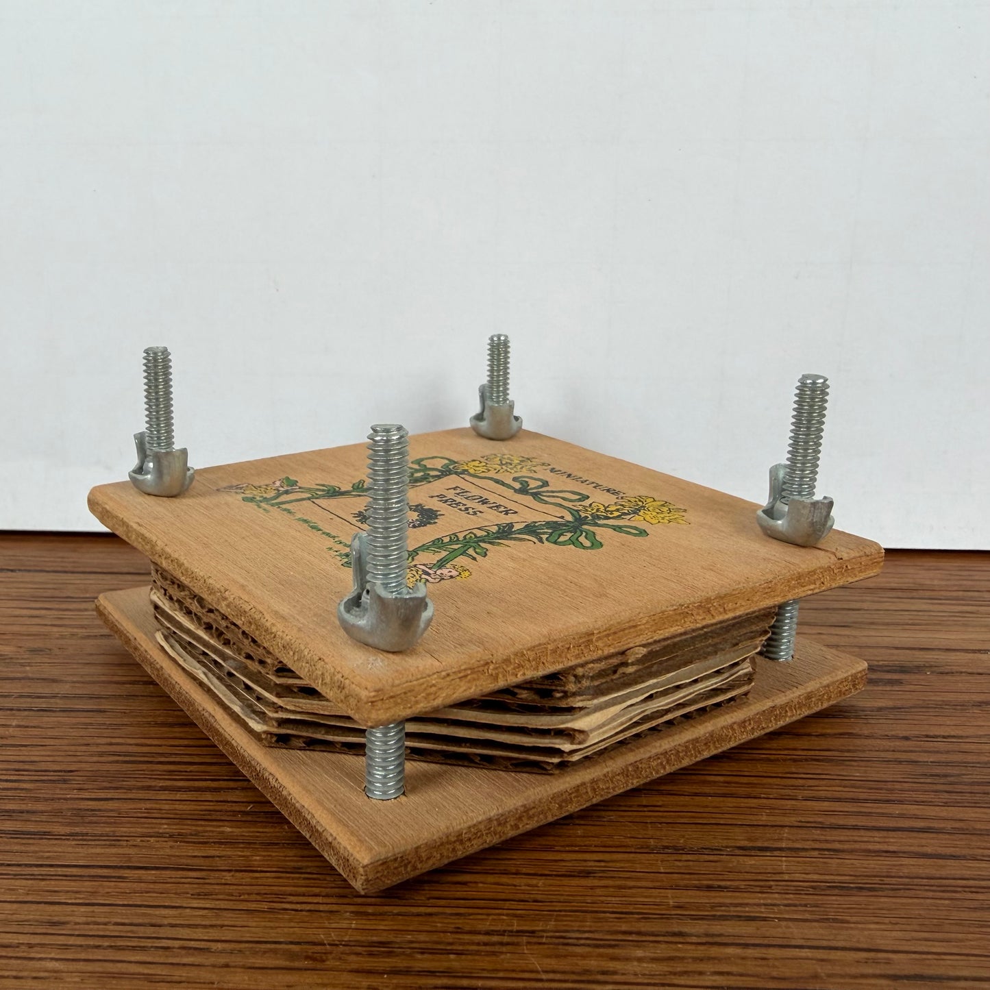 Kleine vintage bloemenpers