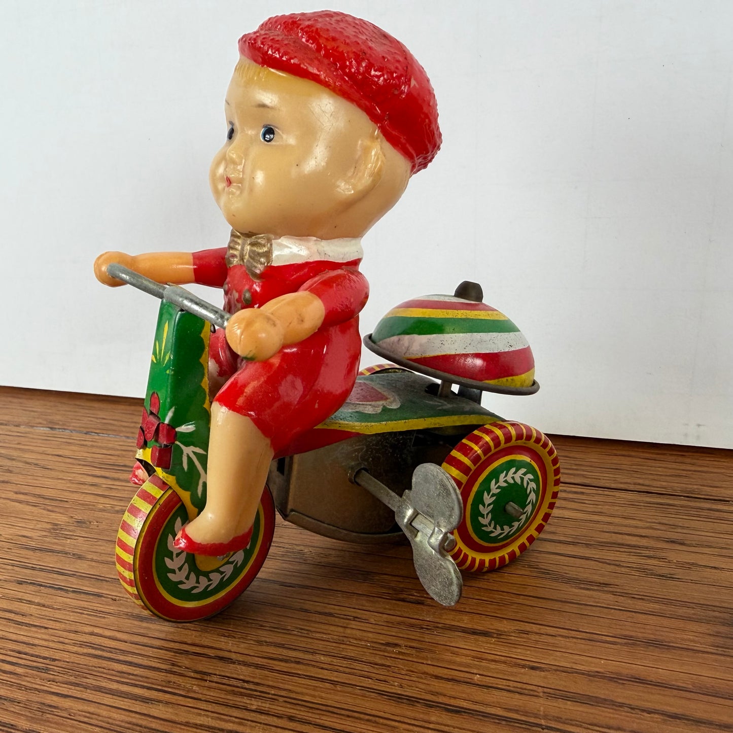 Vintage blikken speelgoed driewieler