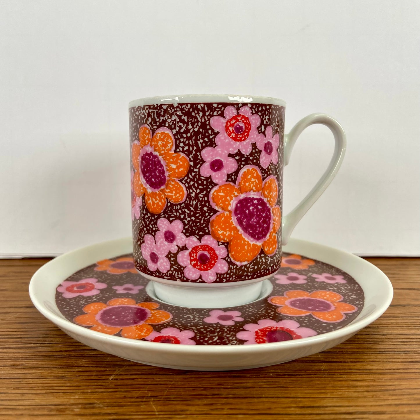 Vintage kop en schotel oranje bruin roze