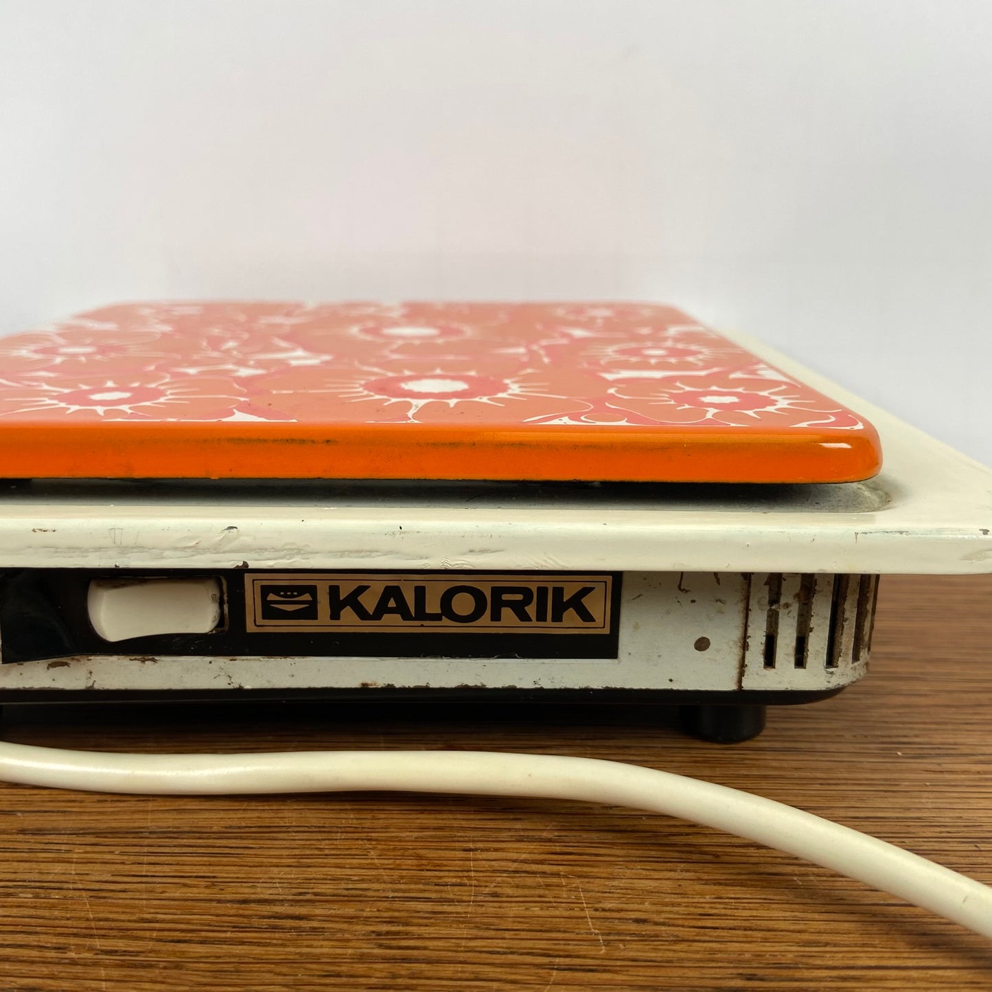 Vintage warmhoud plaatje oranje