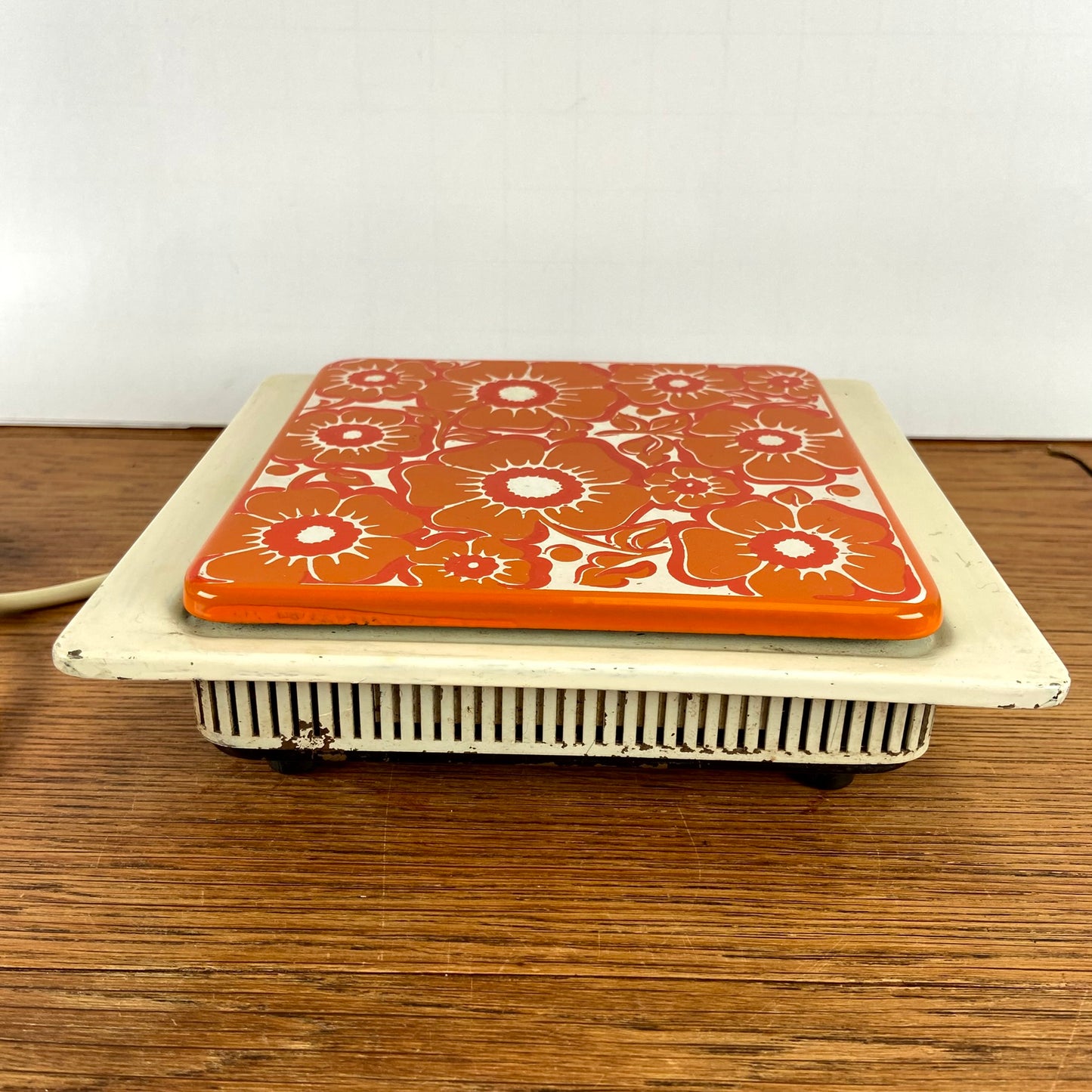 Vintage warmhoud plaatje oranje