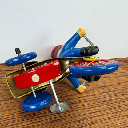 Vintage blikken speelgoed driewieler