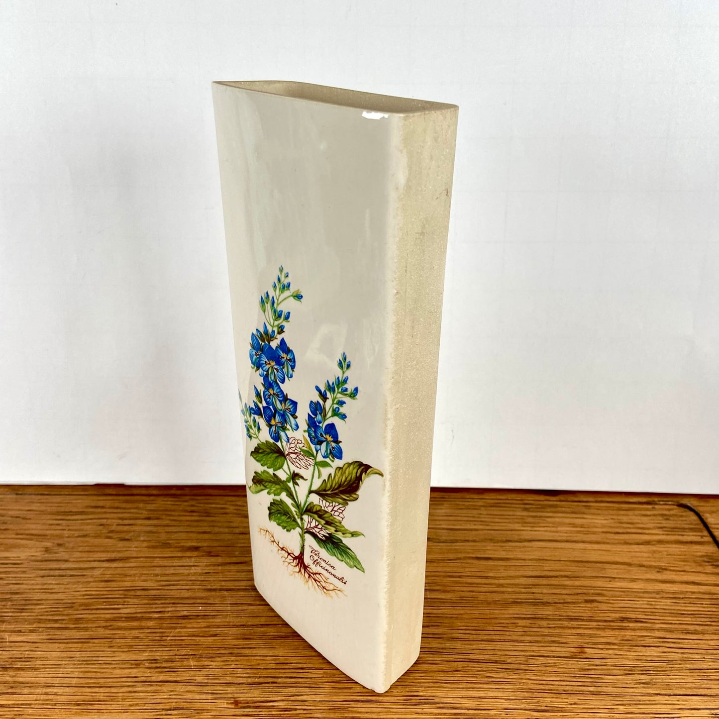 Vintage radiatorbakje blauwe bloem
