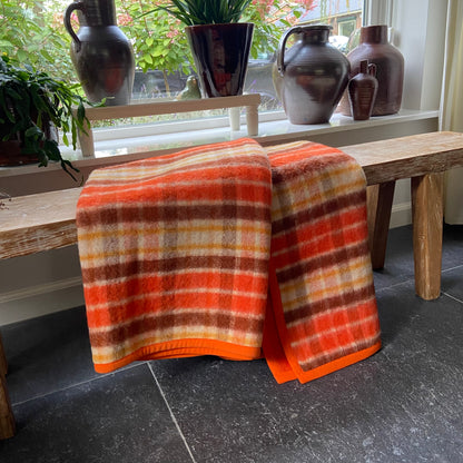 Vintage wollen deken oranje ruit