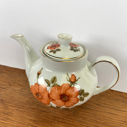 Vintage theepot oranje bloemen