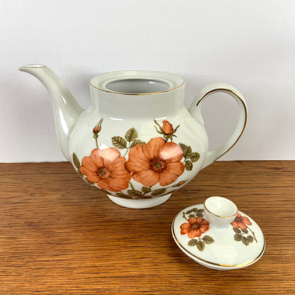 Vintage theepot oranje bloemen