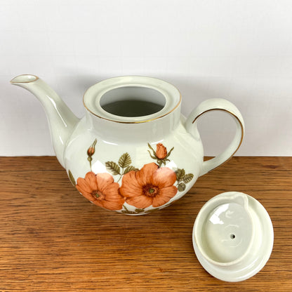 Vintage theepot oranje bloemen