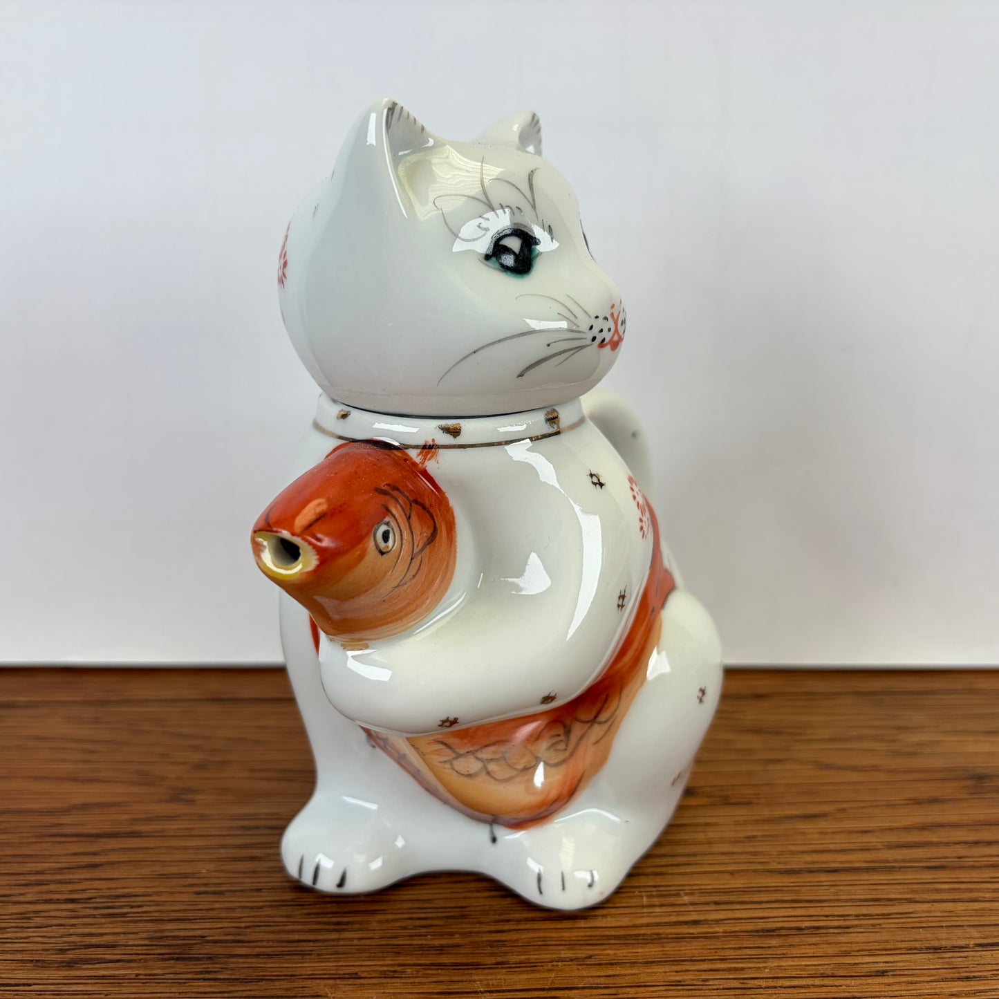 Vintage theepot kat met vis