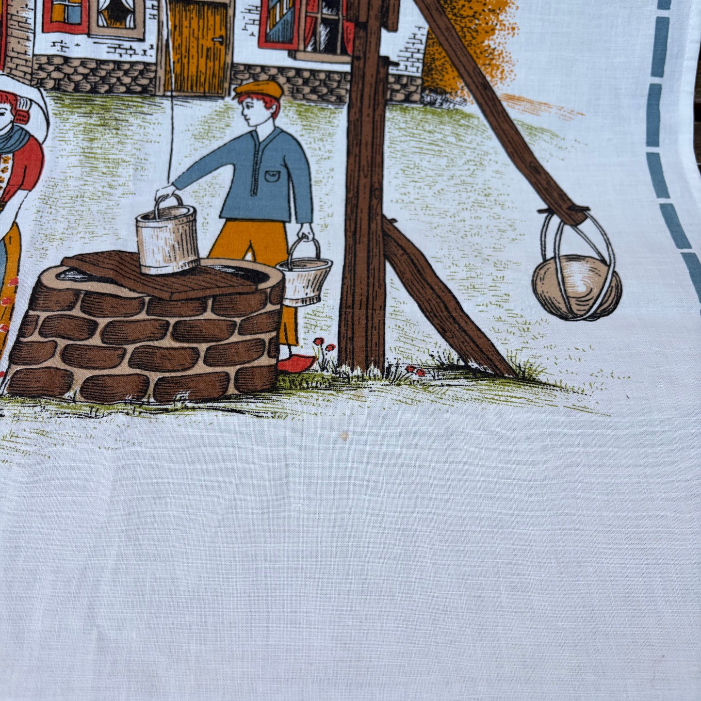 Vintage overhanddoek “Eigen haard is goud waard”