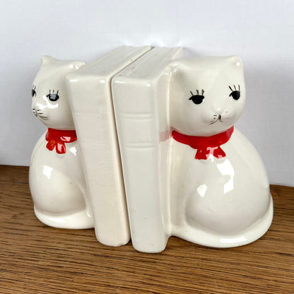 Vintage boekensteunen katten