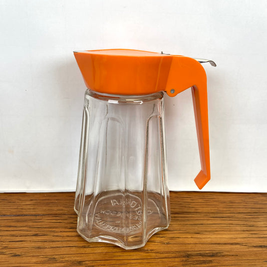 Vintage oranje suikerstrooier