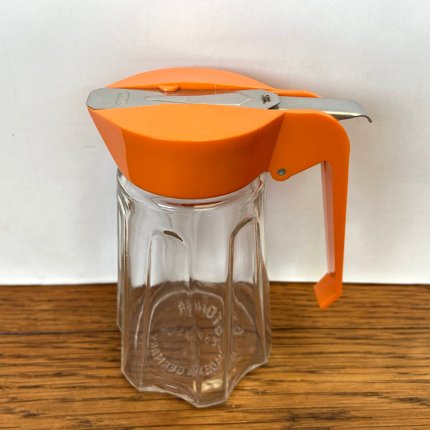 Vintage oranje suikerstrooier