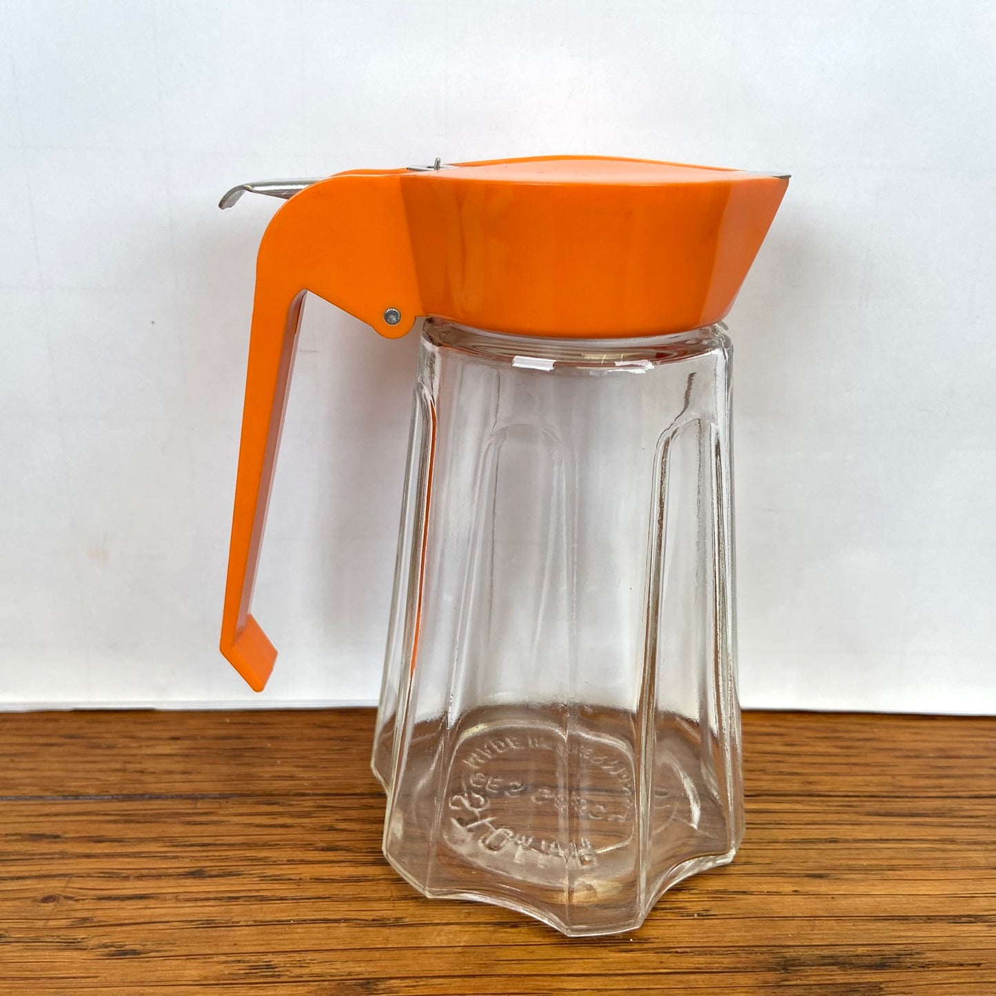 Vintage oranje suikerstrooier