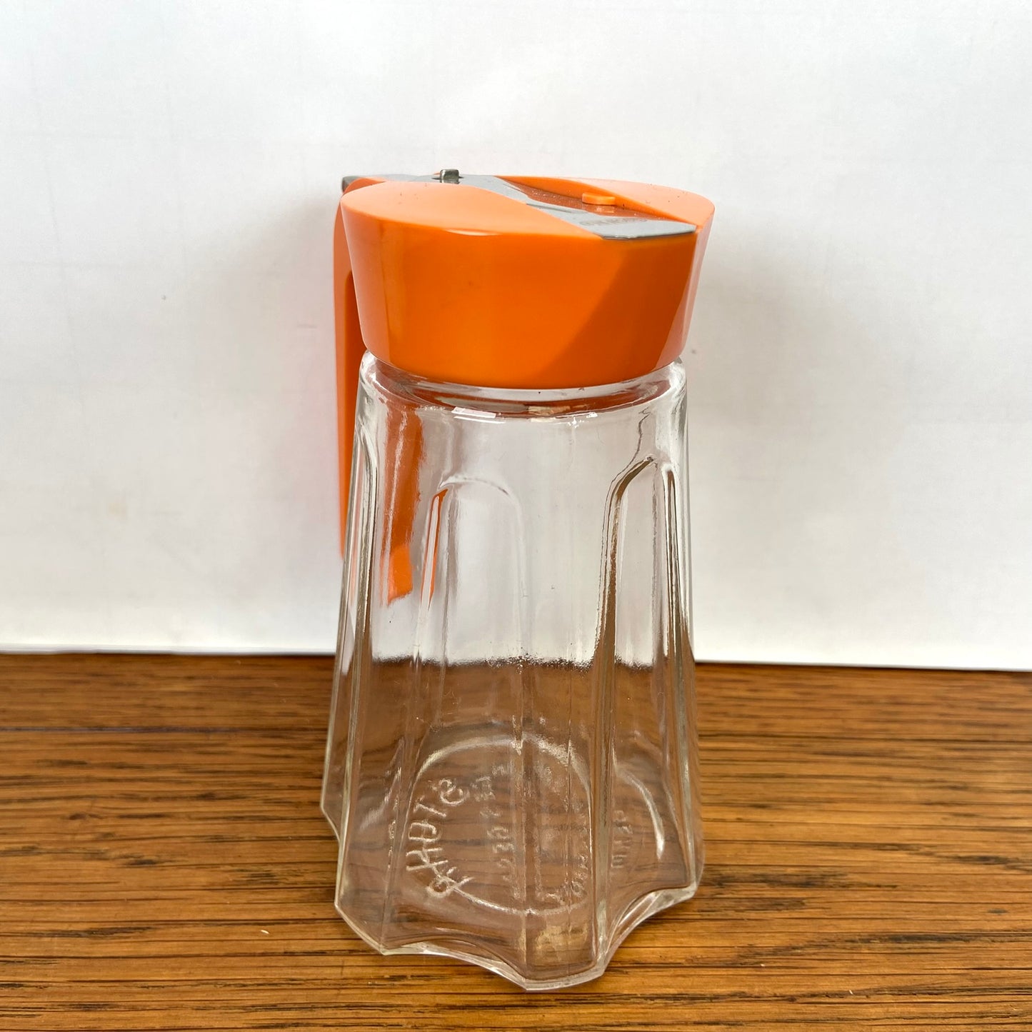 Vintage oranje suikerstrooier