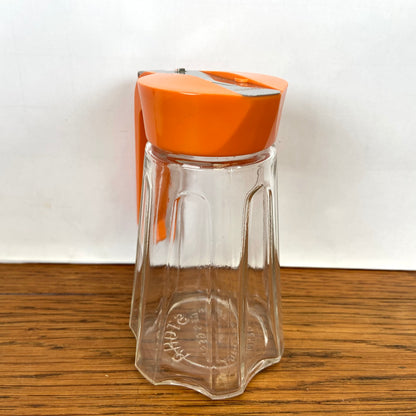 Vintage oranje suikerstrooier