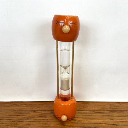 Vintage houten zandloper gezicht