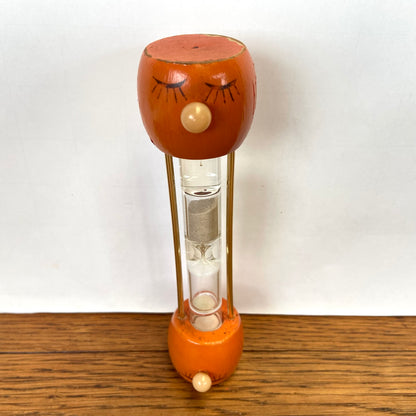 Vintage houten zandloper gezicht