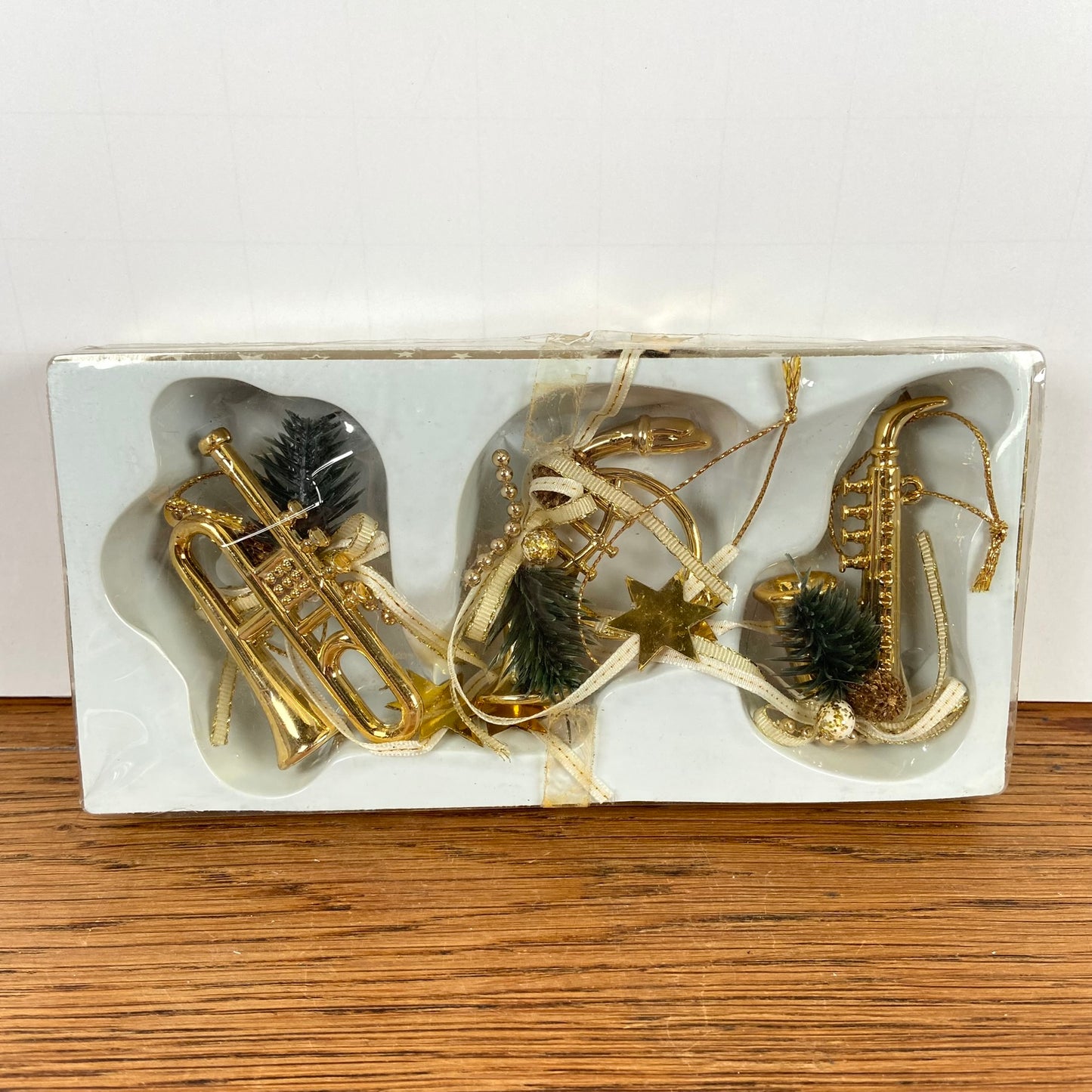 3 messingkleurige muziek hangers