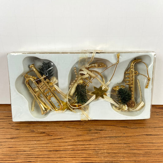 3 messingkleurige muziek hangers