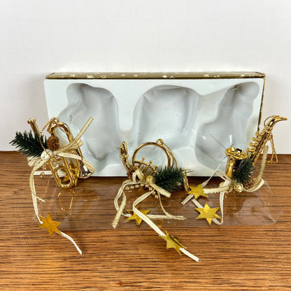 3 messingkleurige muziek hangers